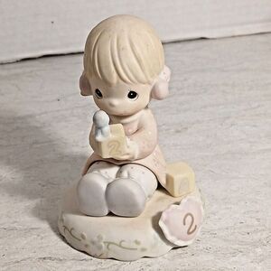 Precious Moments Figure,( Growing in Grace ), Age 2 1994. 4ins Tall.